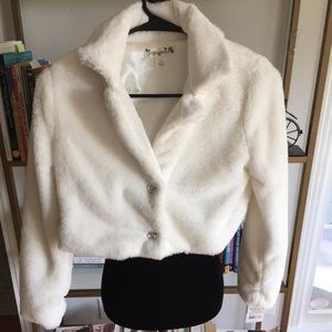 White faux fur coat. New with tags.